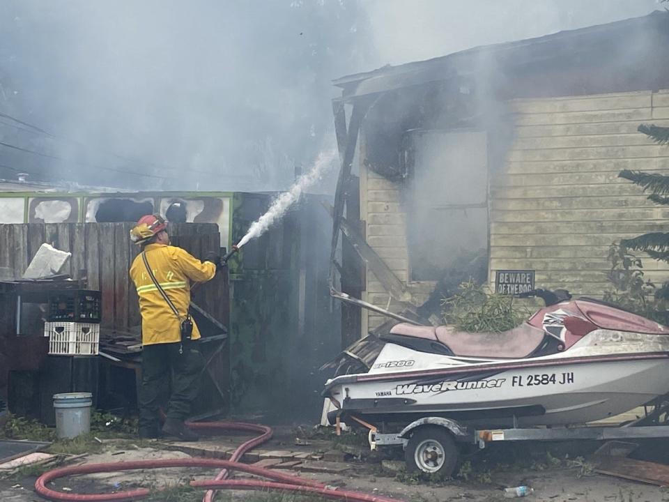 A wildfire damaged or destroyed multiple homes in the area of Akorn Street in Sharpes.