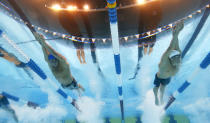 Brendan Hansen, left, and Michael Phelps swim in the men's 400-meter individual medley final at the U.S. Olympic swimming trials, Monday, June 25, 2012, in Omaha, Neb. (AP Photo/David Phillip)