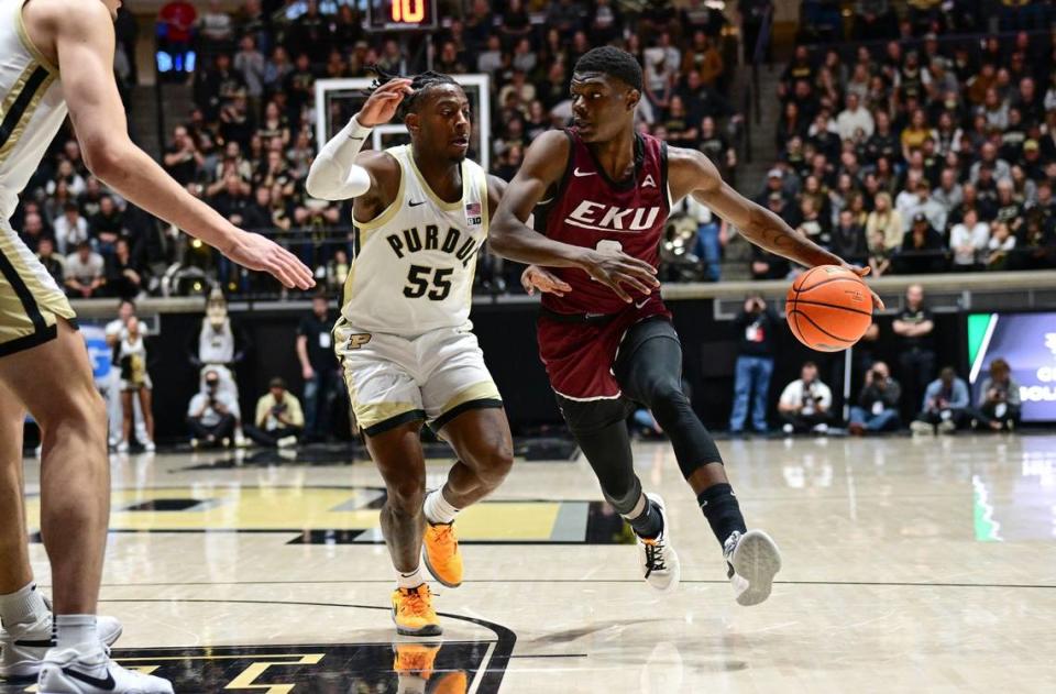 Eastern Kentucky men’s basketball sophomore guard Leland Walker (2) drives toward the basket against Purdue guard Lance Jones (55) during the first half on a game on Dec. 29, 2023. Walker has 91 assists so far this season.