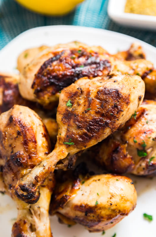 <p>The Life Jolie</p><p>Grilled lemon pepper chicken drumsticks are exactly what your summer grilling dreams are made of. They're so easy to make and have deliciously crispy and flavorful skin on the outside and perfectly tender meat on the inside!</p><p><strong>Get the recipe: <a href="https://www.thelifejolie.com/lemon-pepper-chicken-drumsticks/" rel="nofollow noopener" target="_blank" data-ylk="slk:Grilled Lemon Pepper Chicken Drumsticks;elm:context_link;itc:0;sec:content-canvas" class="link "><em>Grilled Lemon Pepper Chicken Drumsticks</em></a></strong></p>