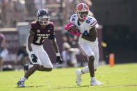Florida tight end Kyle Pitts (84) catches a pass as Texas A&M defensive back Jaylon Jones (17) defends during the first quarter of an NCAA college football game, Saturday, Oct. 10, 2020. in College Station, Texas. (AP Photo/Sam Craft)
