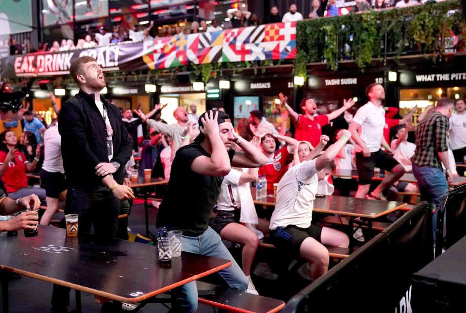 Fans watching England v Denmark (PA Wire)