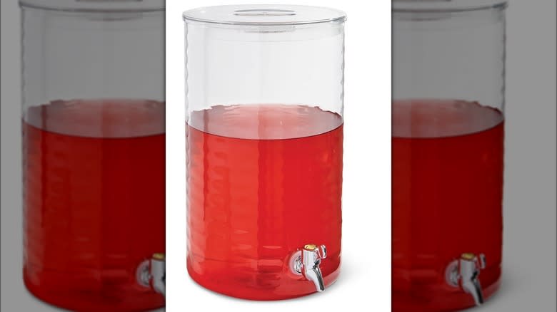 Drink dispenser filled with red liquid