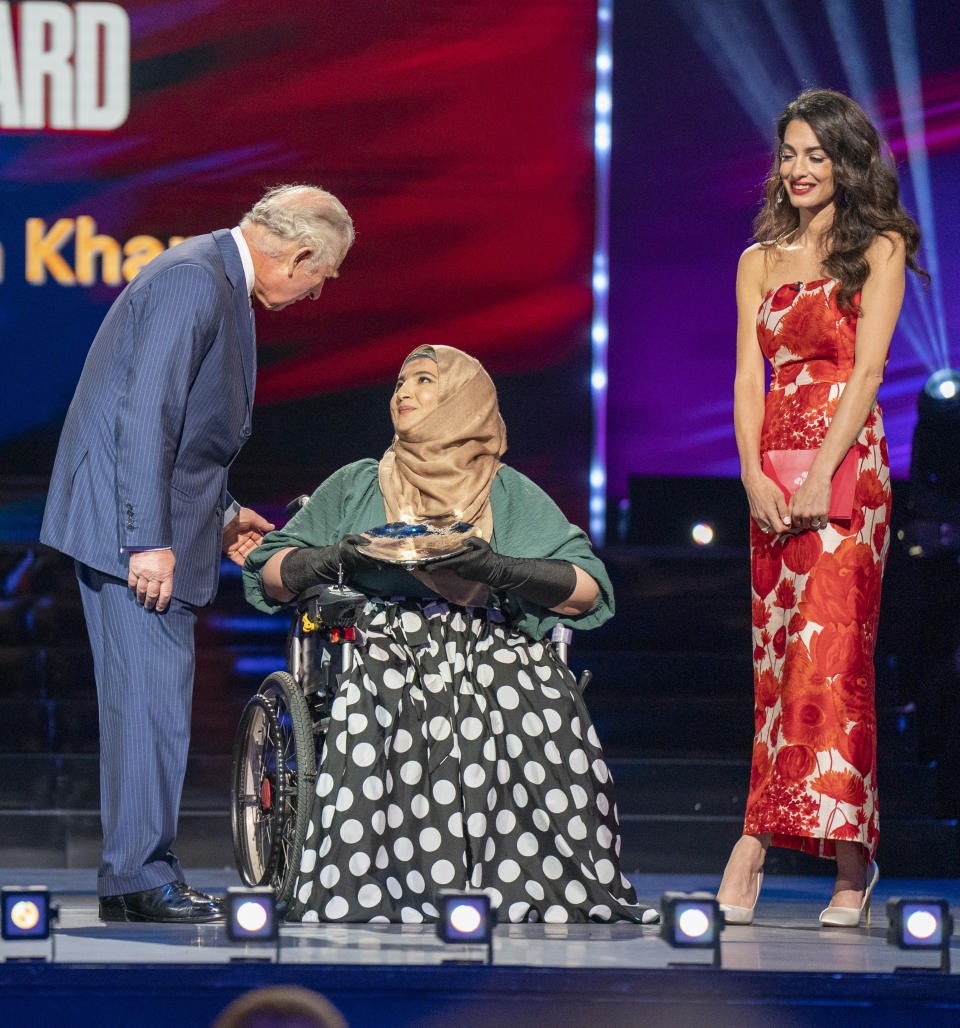 The Prince of Wales and Amal Clooney with Women's Empowerment award winner Tanzila Khan at the eighteenth Prince's Trust Awards at the Theatre Royal, London. Picture date: Tuesday May 24, 2022.