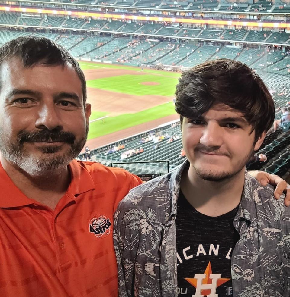 One of the last photos of Paul Castro and his son David, taken at the Houston Astros game before the road rage shooting (Paul Castro)