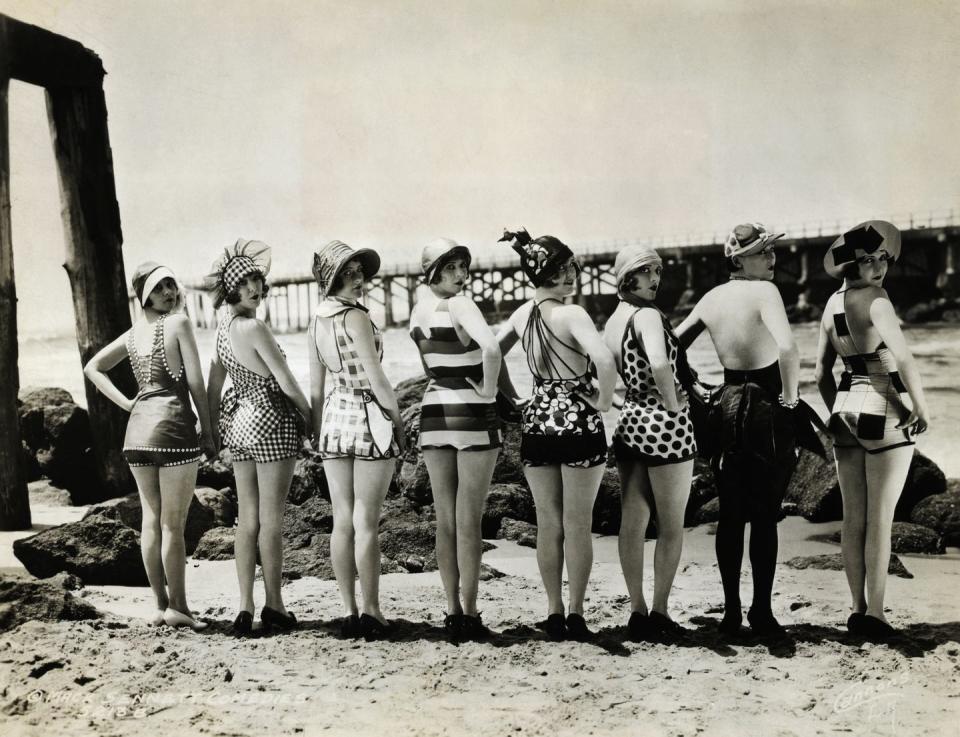 <p>A group of Sennett Bathing Beauties show off their swimwear on a Californian beach. The performing beauts were rallied together by film producer Mack Sennett.</p>