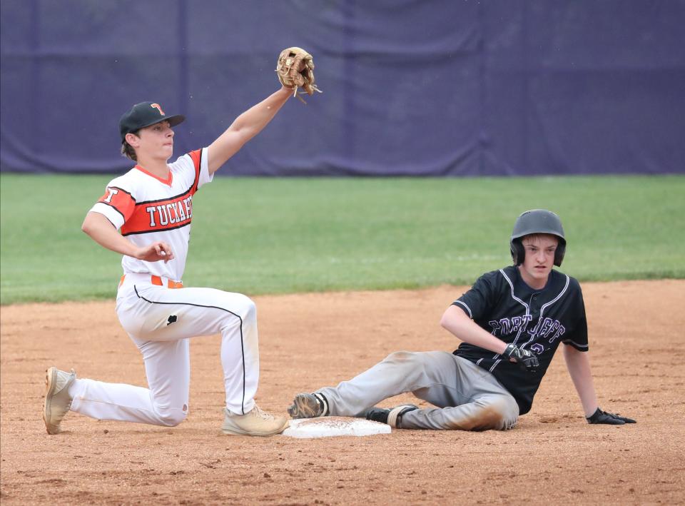 Tuckahoe's Jax Colacicco tags out Port Jefferson player Evan Raymond during game action between Tuckahoe High School and Port Jefferson High School in the boys baseball Class C Regional Final game at John Jay High School in Cross River, June 3, 2023. 