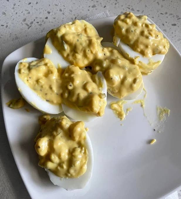 deviled eggs with the filling looking runny