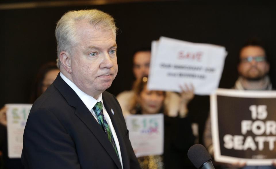 Seattle Mayor Ed Murray addresses a news conference on a proposal to increase the minimum wage in the city Thursday, April 24, 2014, in Seattle. The mayor said his advisory group of business, labor, non-profits and other representatives have not yet agreed on a plan to increase the minimum wage to $15 an hour. (AP Photo/Elaine Thompson)