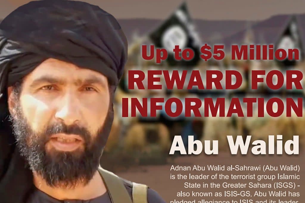 A ‘wanted’ posted of Adnan Abu Walid al-Sahrawi (AP)