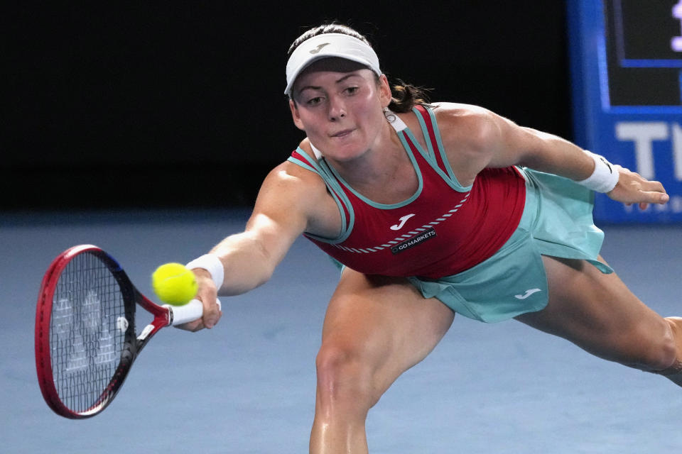 Tamara Zidansek of Slovenia plays a forehand return to Ons Jabeur of Tunisia during their first round match at the Australian Open tennis championship in Melbourne, Australia, Tuesday, Jan. 17, 2023. (AP Photo/Aaron Favila)