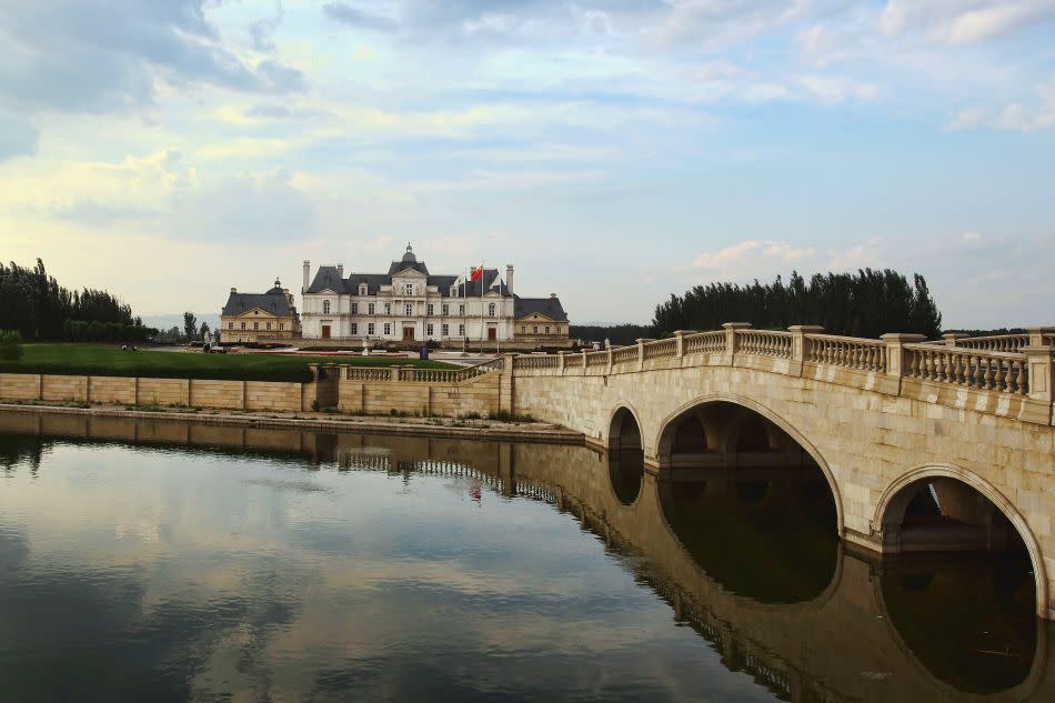 The hotel is surrounded by a moat and vineyards and are staffed with guards attired in traditional French uniform.
