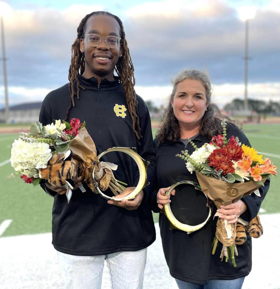 Jalin Murphy, District Teacher of the Year, and Kay McGuire, District Support Person of the Year, were announced by the Harris County School District as the award winners before the Sept. 15, 2023, Harris County High School football game. Murphy will now compete for the title of Georgia Teacher of the Year. Rachel Crumbley/Harris County School District