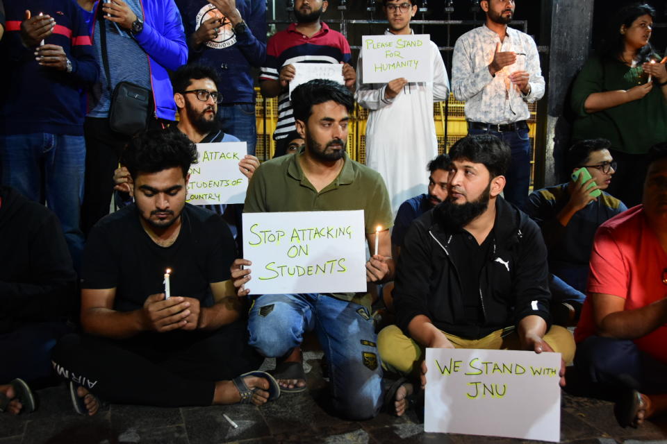 Candlelight protest against the attack on JNU students outside Gateway of India in Mumbai.