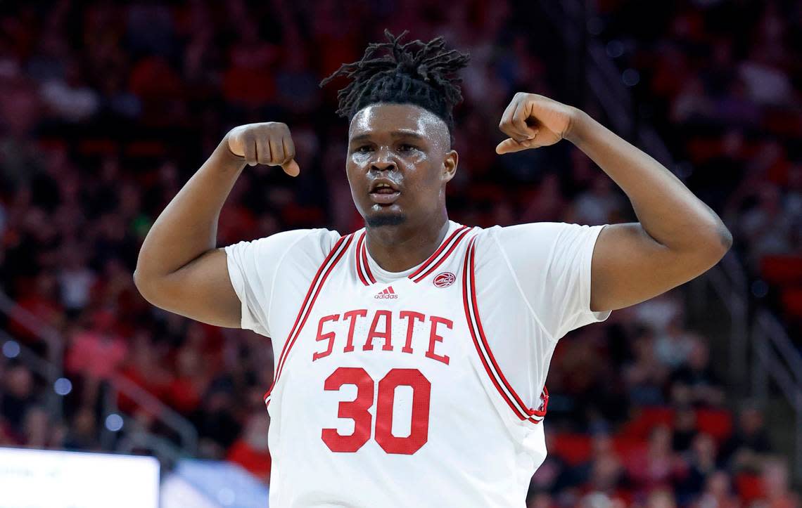 N.C. State’s D.J. Burns Jr. (30) celebrates after making a basket during the first half of N.C. State’s game against Wake Forest at PNC Arena in Raleigh, N.C., Wednesday, Feb. 22, 2023.