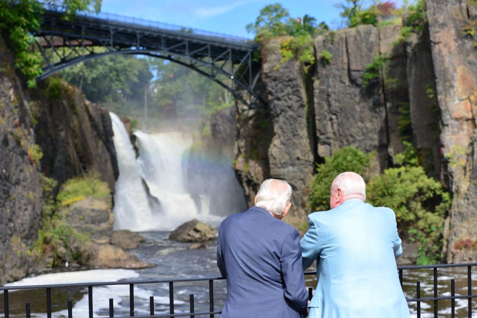 At left, U.S. Congressman Bill Pascrell and Pat Kramer, former Paterson Mayor, talk before the celebration marking the completion of the new Great Falls amphitheater in Paterson Friday on October 5, 2018. 