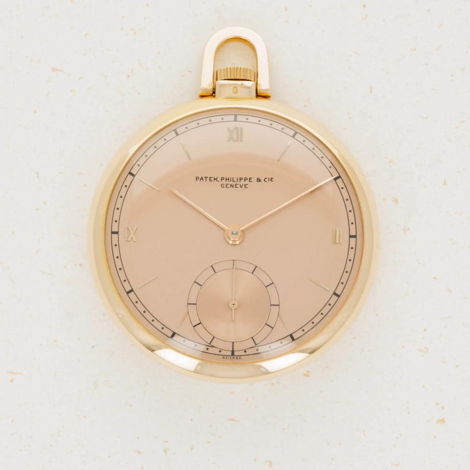 This pocket watch from Patek Philippe dates to the 1940s and exemplifies the traditional salmon dial color created in the traditional manner with electroplating.