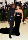 <p>Kylie Jenner arrived on the red carpet with her baby daddy Travis Scott, wearing a simple black Alexander Wang cut-out dress. Photo: Getty Images </p>