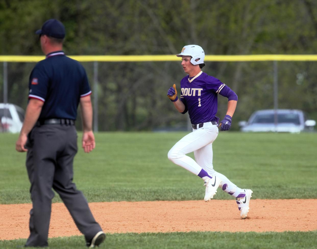 Jacksonville Routt's Eli Olson sprints to second base for a double against Jacksonville in a nonconference baseball game at Alumni Field on Saturday, April 27, 2024. Jacksonville won 13-8.