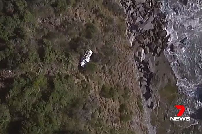 The car rolled 70 metres down the embankment. Image: 7 News