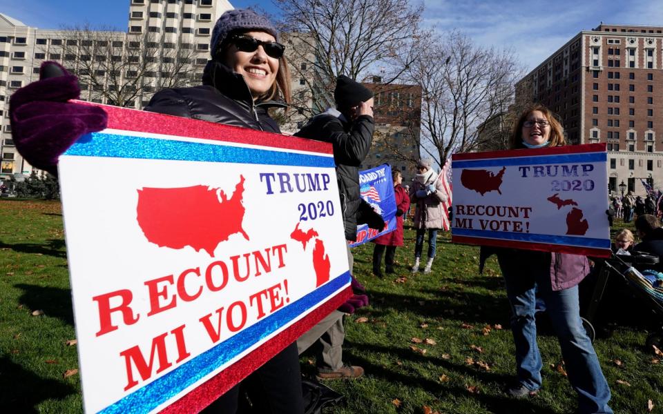 Trump supporters rally in Lansing, Michigan on November 14 - Paul Sancya /AP 