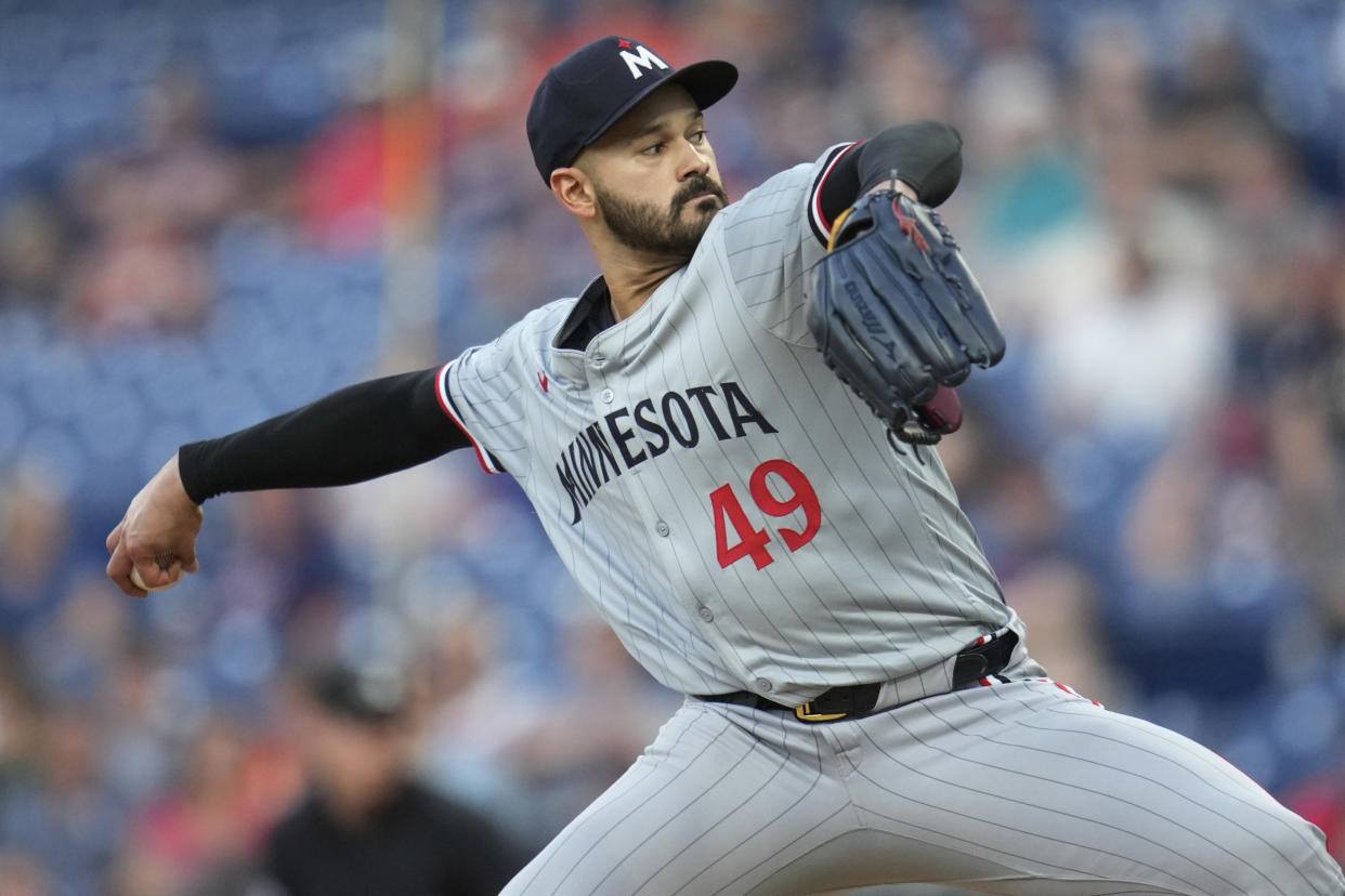 Minnesota Twins' Pablo Lopez pitches in the first inning of a baseball game against the Cleveland Guardians, Monday, Sept. 16, 2024, in Cleveland. (AP Photo/Sue Ogrocki)