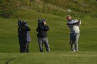 Team Europe's Tyrrell Hatton hits on the second hole during a foursomes match the Ryder Cup at the Whistling Straits Golf Course Saturday, Sept. 25, 2021, in Sheboygan, Wis. (AP Photo/Jeff Roberson)