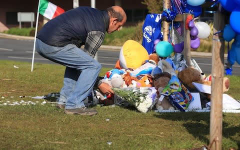 A man leaves flowers outside Alder Hey Children's Hospital following the death of Alfie Evans - Credit: Peter Byrne/PA Wire