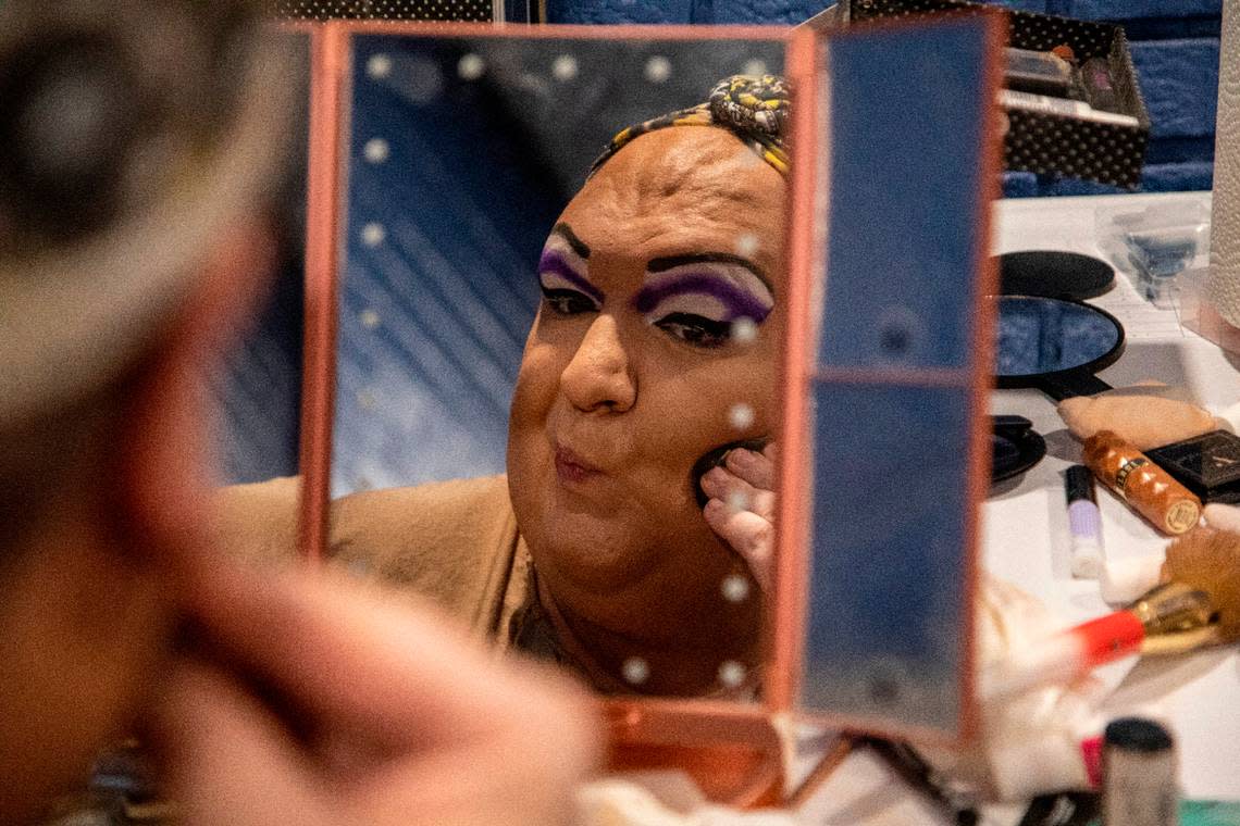Brenda the 7-foot drag queen from Greensboro gets ready backstage before hosting North Carolina’s oldest running drag show, Green Queen Bingo, which dates to 2004 and regularly fills Piedmont Hall in Greensboro.