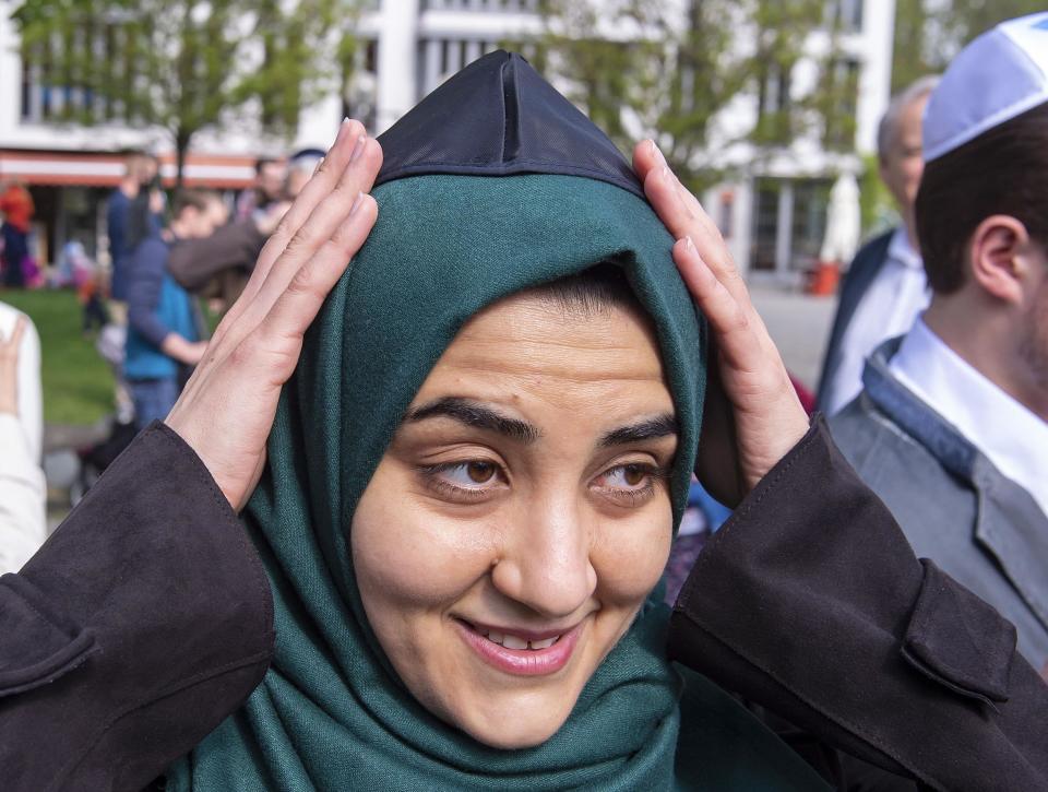 Iman Jamous wears the kippah during a demonstration against antisemitism in Erfurt, Germany: AP