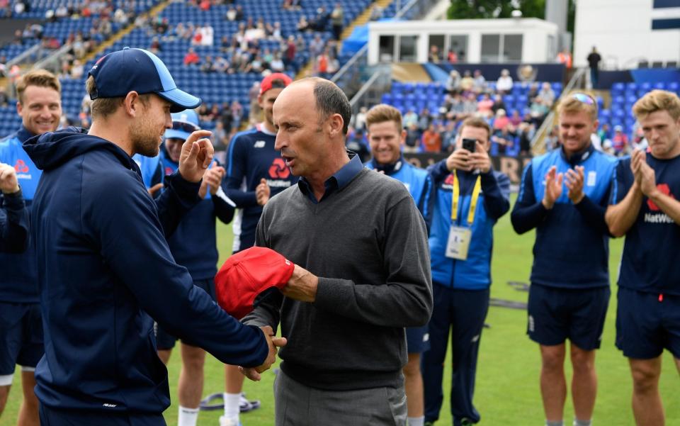 Nasser Hussain (r) presents Dawid Malan with his International cap  - Credit: Getty