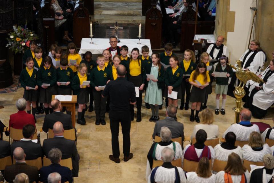 Isle of Wight County Press: Newport CE Primary pupils singing. Prince Edward in the front row.