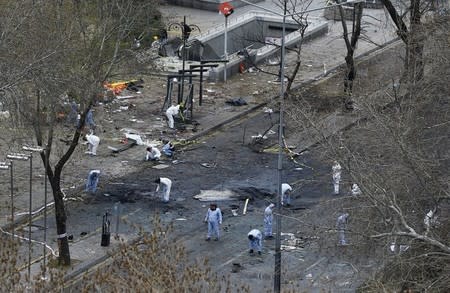 Forensic officers work on the site of a suicide bomb attack in Ankara, Turkey March 14, 2016. To match TURKEY-BLAST/SECURITY REUTERS/Umit Bektas