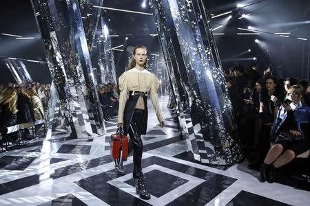 A model wears a creation by French designer Louis Vuitton as part