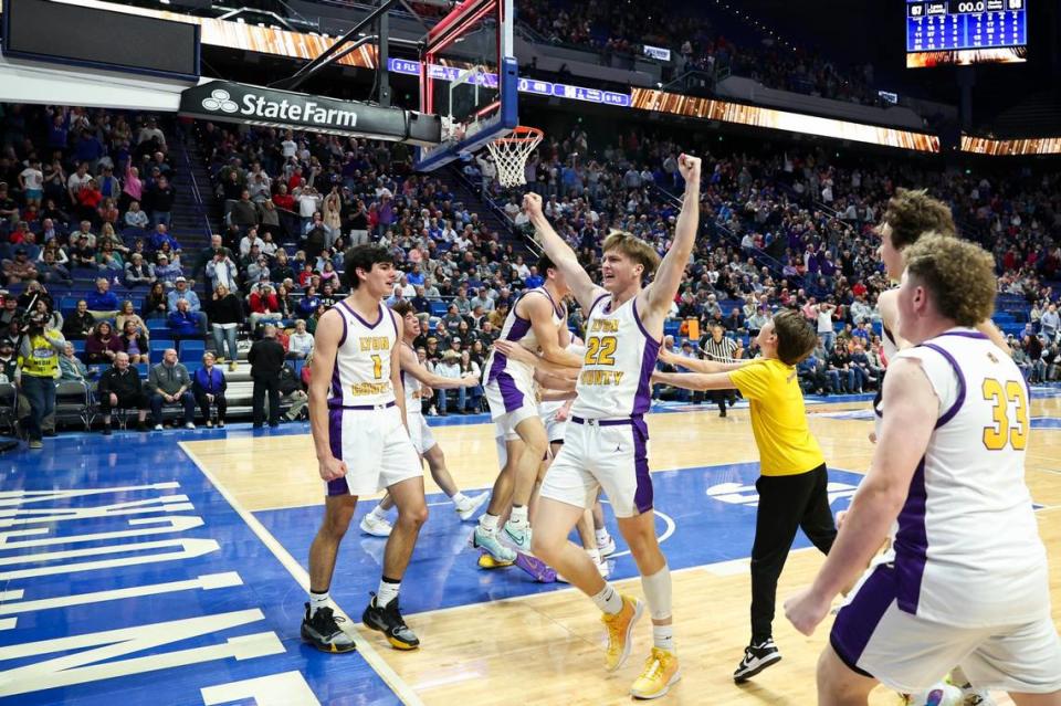 Lyon County’s Brady Shoulders (22) celebrates the Lyons defeating Harlan County 67-58 to win the Boys’ Sweet 16 championship game. Silas Walker/swalker@herald-leader.com