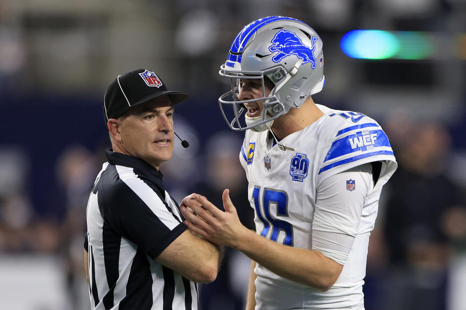 ARLINGTON, TEXAS – DECEMBER 30: Jared Goff #16 of the Detroit Lions argues a call with field judge Nate Jones #42 against the Dallas Cowboys during the fourth quarter in the game at AT&T Stadium on December 30, 2023 in Arlington, Texas. (Photo by Ron Jenkins/Getty Images)