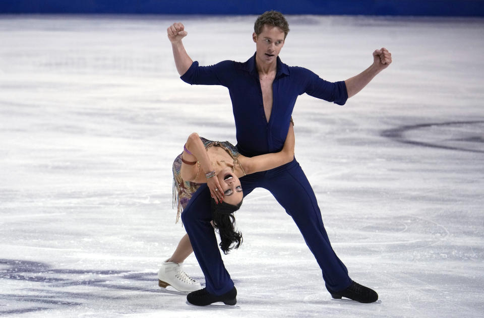 Madison Chock and Evan Bates of the United States perform in the ice dance rhythm dance program at the Four Continents Figure Skating Championships on Friday, Feb. 10, 2023, in Colorado Springs, Colo. (AP Photo/David Zalubowski)