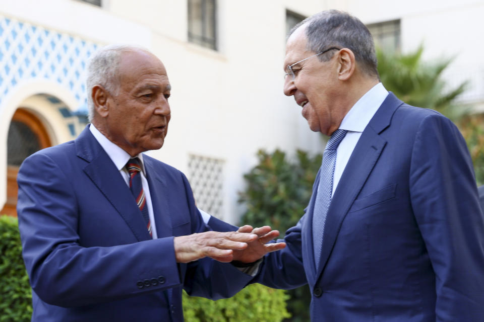 FILE - In this photo released by Russian Foreign Ministry Press Service, Russian Foreign Minister Sergey Lavrov, right, listens to Secretary General of the Arab League Secretary General Ahmed Aboul Gheit during their meeting in Cairo, Egypt, July 24, 2022. The Biden administration likes to say that Russia is now isolated internationally because of its invasion of Ukraine. Yet its top officials are hardly sitting lonely and isolated in the Kremlin and now the U.S. wants to talk.(Russian Foreign Ministry Press Service via AP, File)