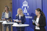 Susanna Trehorning, deputy head of constitutional protection and counter-terrorism, center, security police chief Charlotte von Essen and Ahn-Za Hagstrom, head of the National Center for Terror Threat Assessment (NTC), right, at a press conference at the Security Police in Stockholm, Thursday Aug. 17, 2023. Sweden on Thursday raised its terrorism alert level one notch to the second-highest following recent Quran burnings in the Scandinavian country by a handful of anti-Islam activists, which sparked angry demonstrations in Muslim countries. (Henrik Montgomery/TT News Agency via AP)