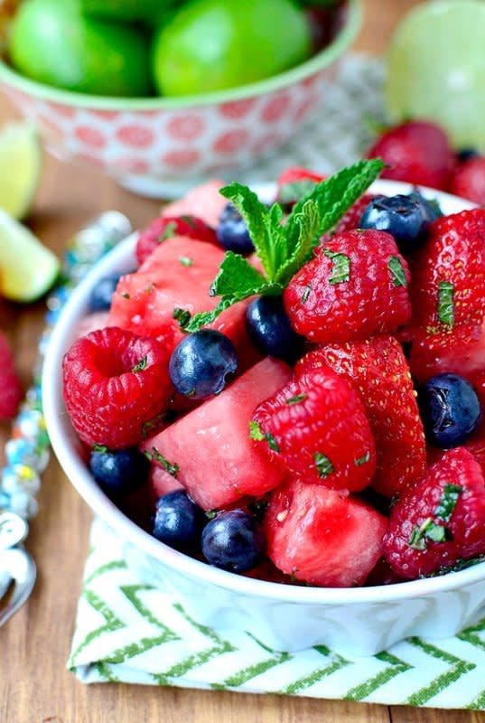 <p>Iowa Girl Eats</p><p>Mojito fruit salad is a refreshing, non-alcoholic fruit and berry salad that tastes just like a sweet mojito. <a href="https://iowagirleats.com/mojito-fruit-salad-non-alcoholic/" rel="nofollow noopener" target="_blank" data-ylk="slk:Click HERE for recipe;elm:context_link;itc:0;sec:content-canvas" class="link "><strong>Click HERE for recipe</strong></a>.</p>