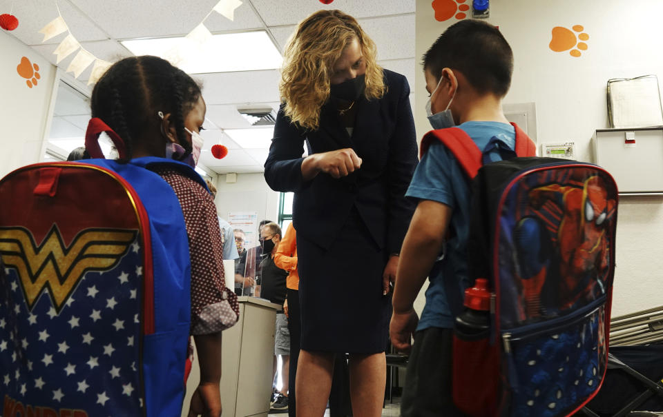 Broward County Schools Interim Superintendent Dr. Vickie L. Cartwright greets students Wednesday, Aug. 16, 2021 in at North Lauderdale Elementary School. More than 261,000 Broward County Public Schools (BCPS) students headed back to school to begin the 2021/22 school year. (Joe Cavaretta/South Florida Sun-Sentinel via AP)