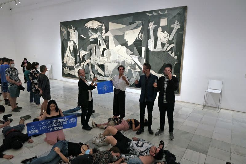 Extinction Rebellion stage a protest at famous Guernica painting at Reina Sofia museum