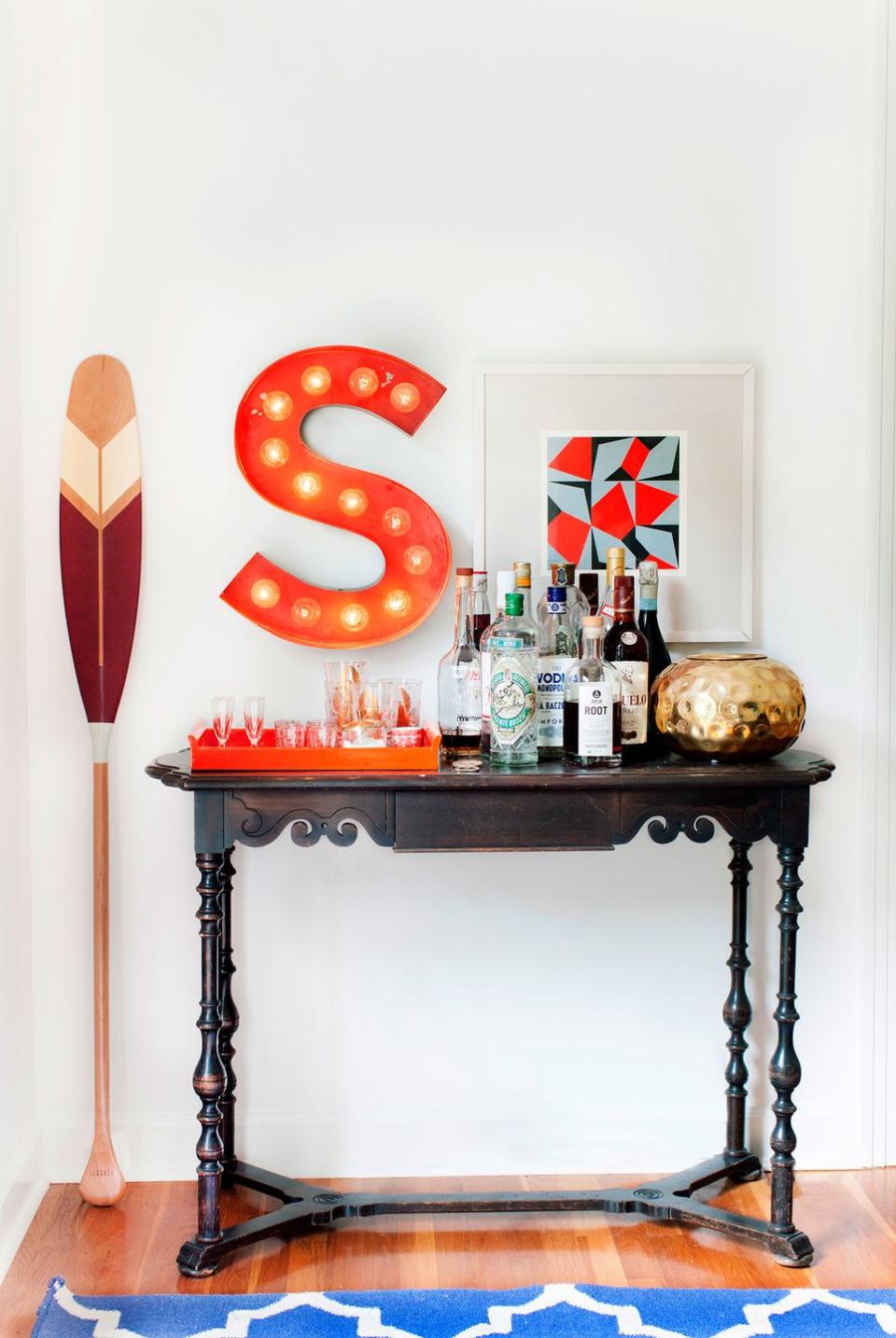 <p>Sometimes, all it takes is a personal touch to pull a room together. Take your bar cart to the next level with a retro-inspired marquee letter, colorful wall art, and a decorative oar to bring style your space.</p>