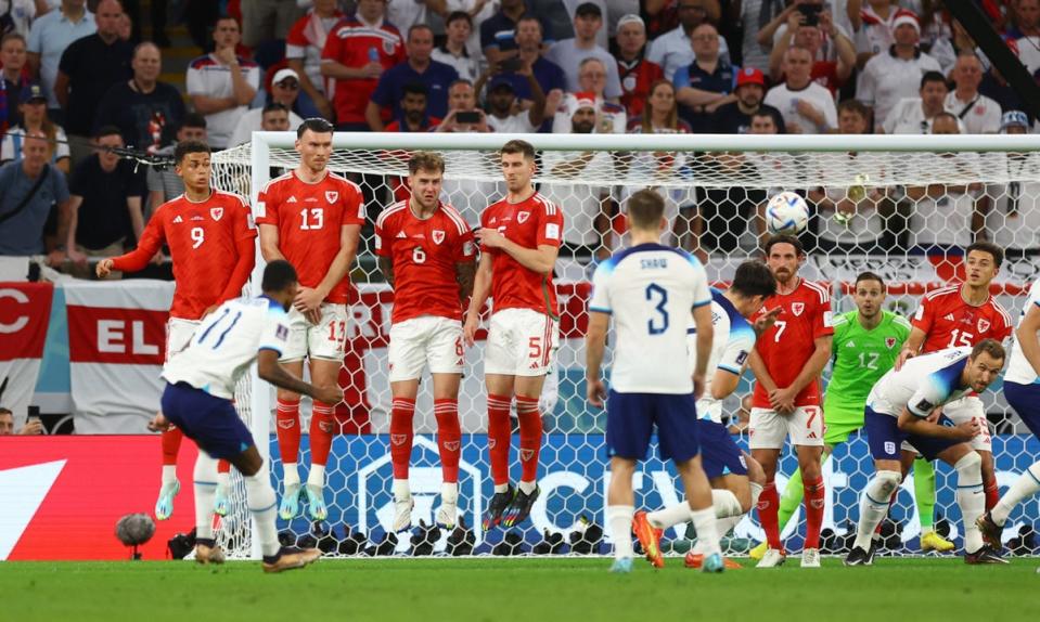 Rashford scores England’s first goal from a free kick (Reuters)