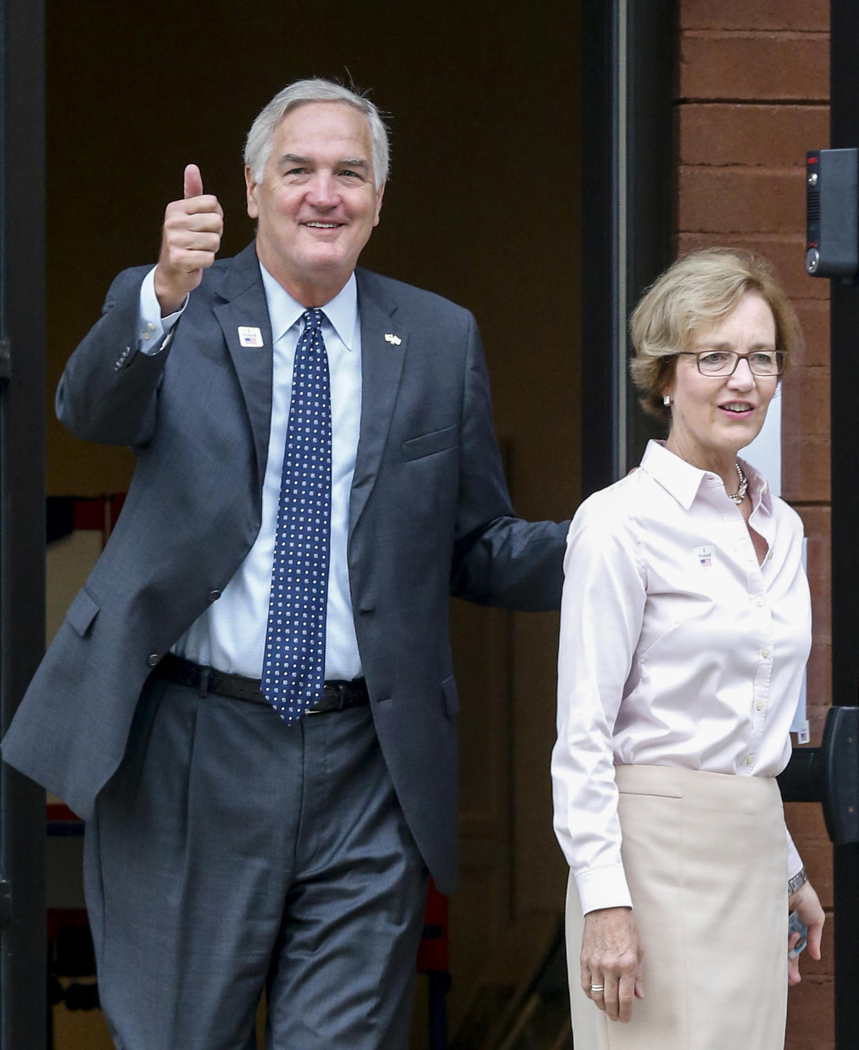 Senator Luther Strange after voting with his wife, Melissa, Tuesday, Aug. 15, 2017, in Homewood, Ala. (Photo: Butch Dill/AP)