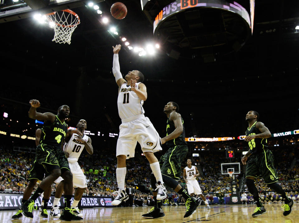 KANSAS CITY, MO - MARCH 10: Michael Dixon #11 of the Missouri Tigers shoots against the Baylor Bears in the first half during the championship game of the 2012 Big 12 Men's Basketball Tournament at Sprint Center on March 10, 2012 in Kansas City, Missouri. (Photo by Jamie Squire/Getty Images)