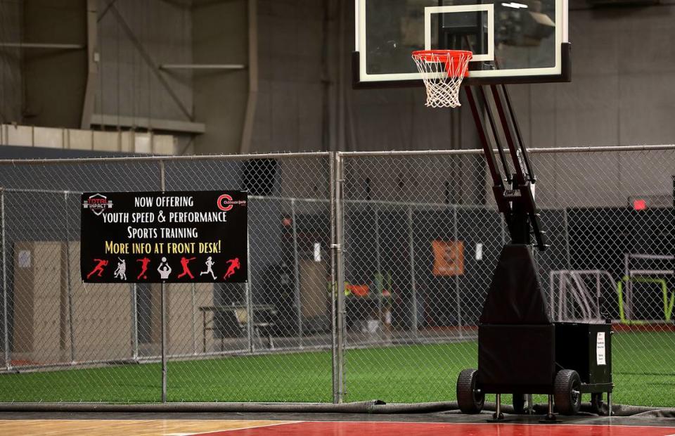 A pair of basketball courts for Clubhouse Sports Academy sit in the middle of the arena space inside the HAPO Center at 6600 Burden Blvd in Pasco.