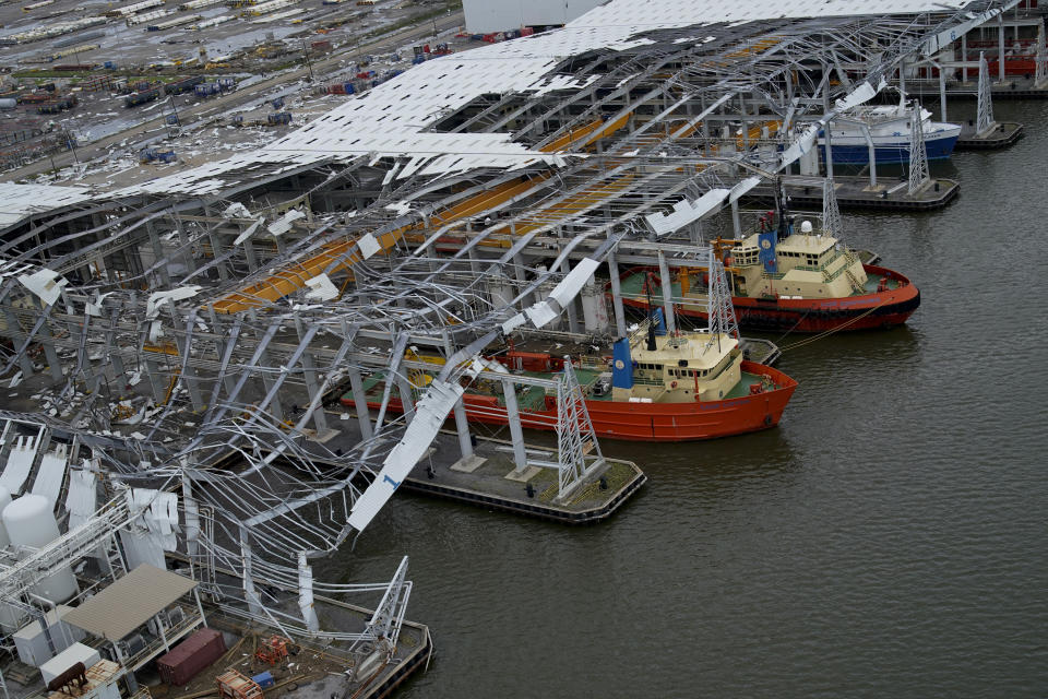 Damage to ship docking facilities are seen in the aftermath of Hurricane Ida in Port Port Fourchon, La., Tuesday, Aug. 31, 2021. (AP Photo/Gerald Herbert)