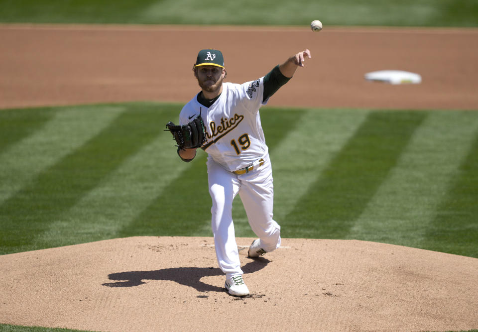 Oakland Athletics pitcher Cole Irvin (19) throws to a Detroit Tigers batter during the first inning of a baseball game on Saturday, April 17, 2021, in Oakland, Calif. (AP Photo/Tony Avelar)