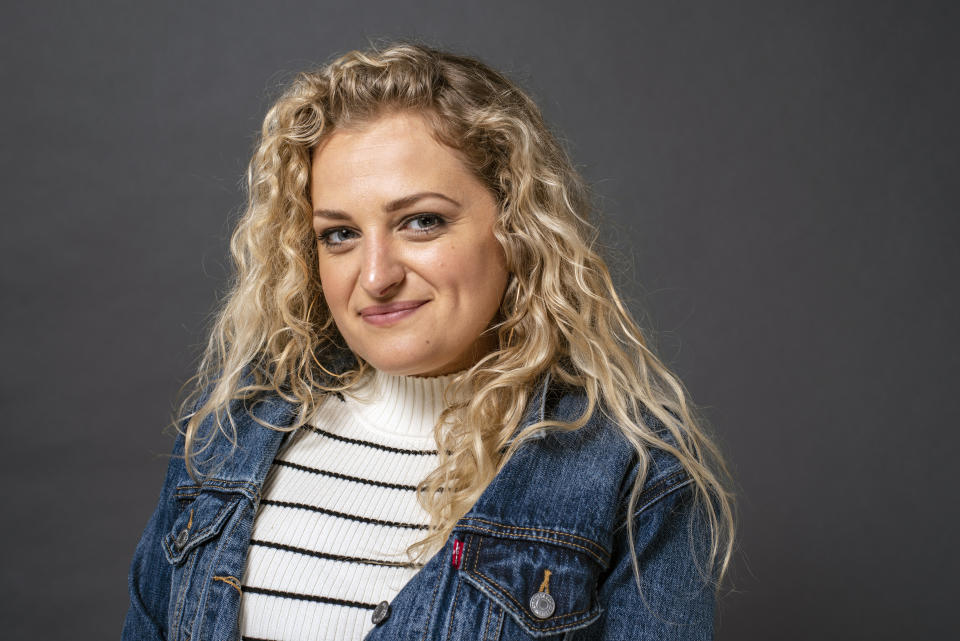 In this Thursday, May 30, 2019, photo, Ali Stroker poses for a portrait in New York. Stroker is on the cusp of musical theater history. At the upcoming Tony Awards, she could become the first person in a wheelchair to win a Tony. (Photo by Scott Gries/Invision/AP)